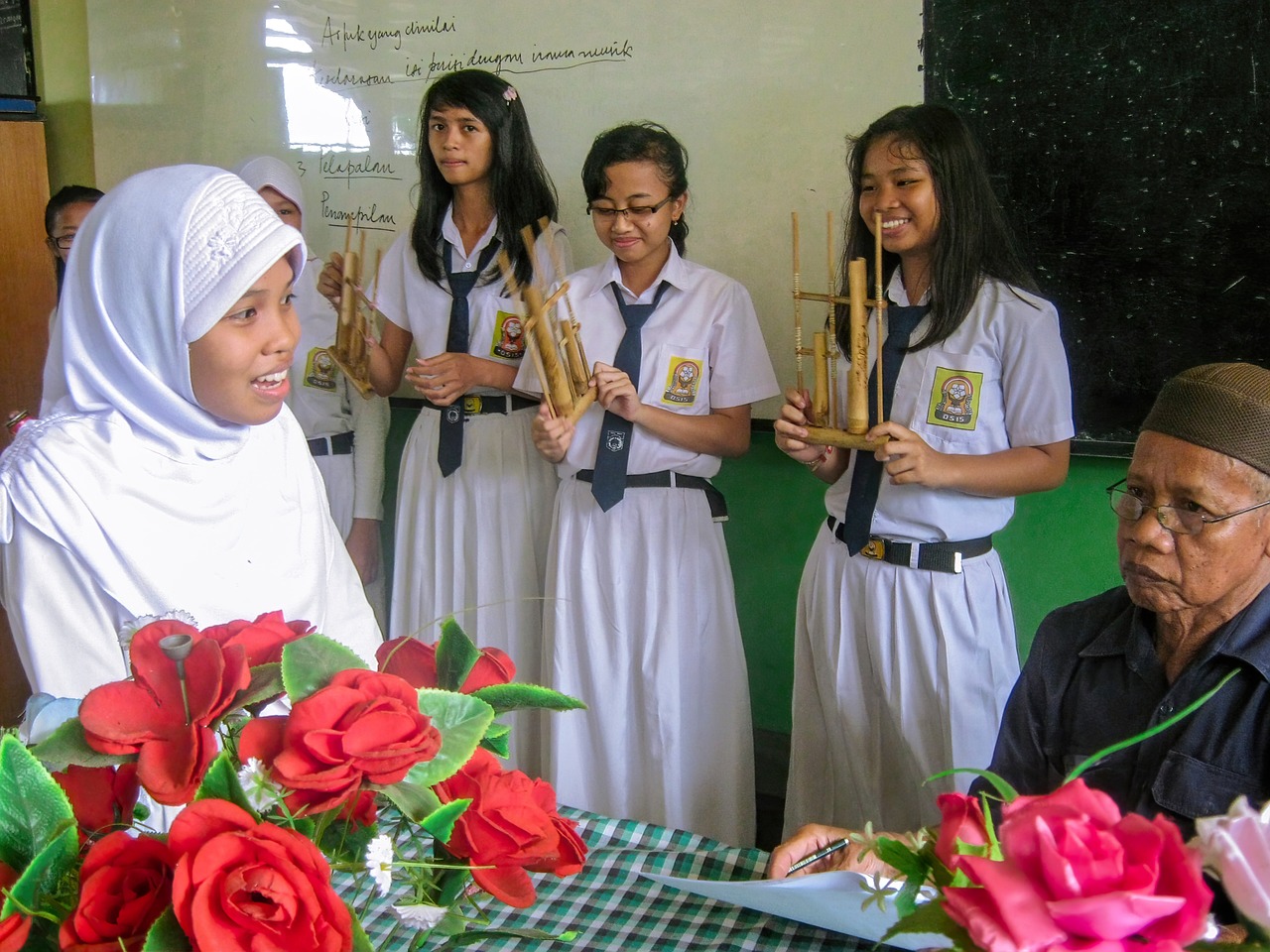 piano teacher teaching student